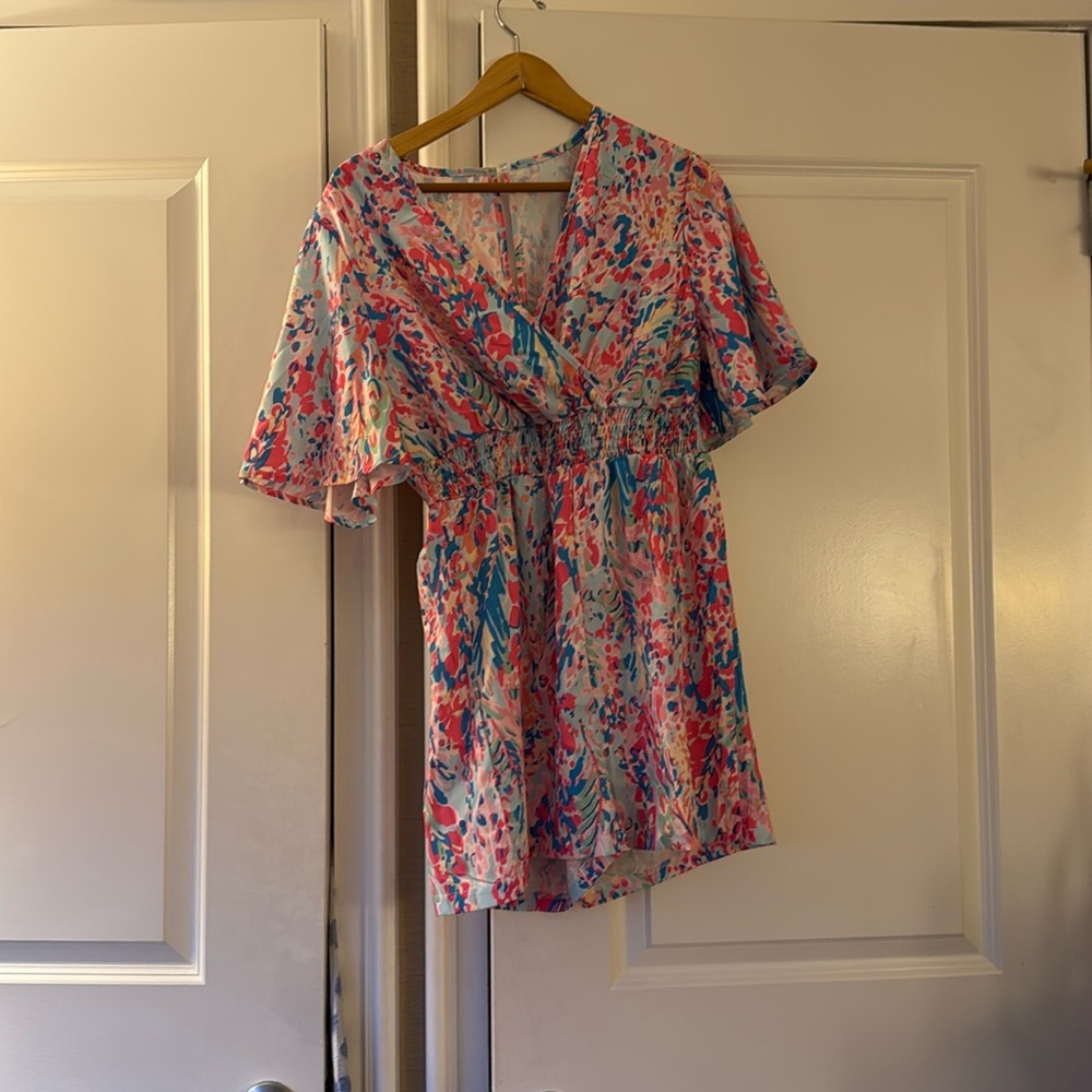 Never worn colorful romper great for summer